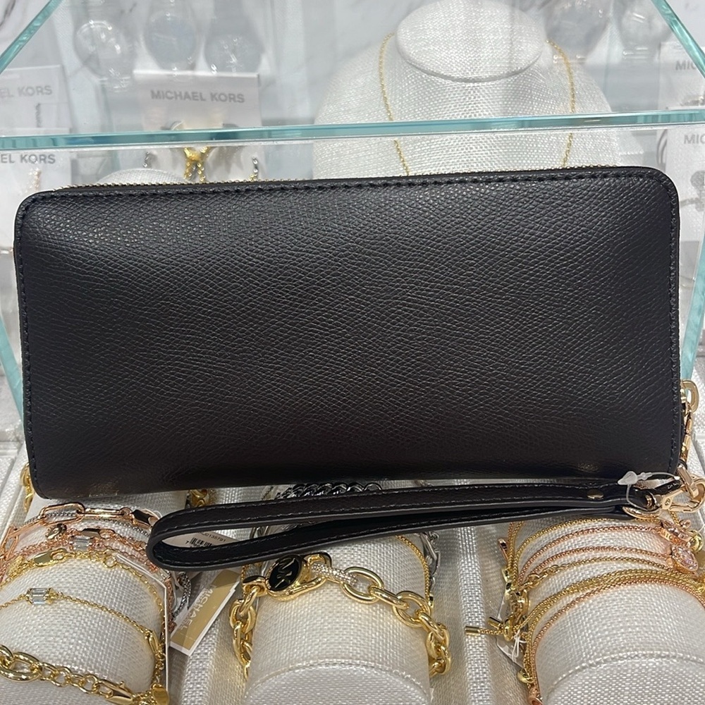 Michael Kors JST Lg Leather Continental Wallet Wristlet Phone Holder
Chocolate - Picture 11 of 16
